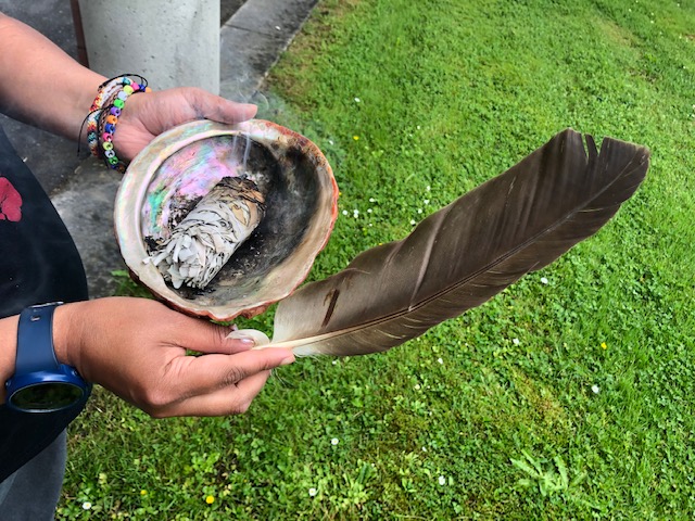 Sage and feather for smudging