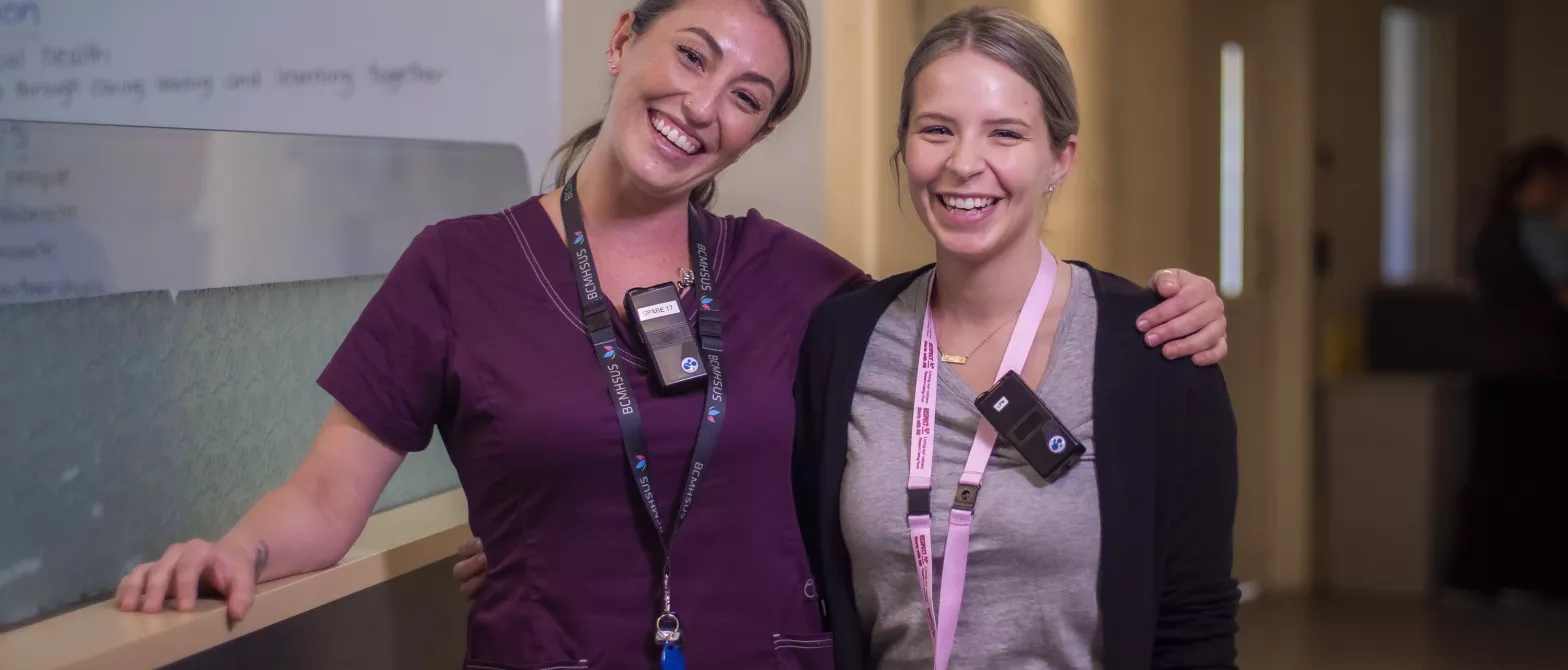 Two BCMHSUS nurses smiling 