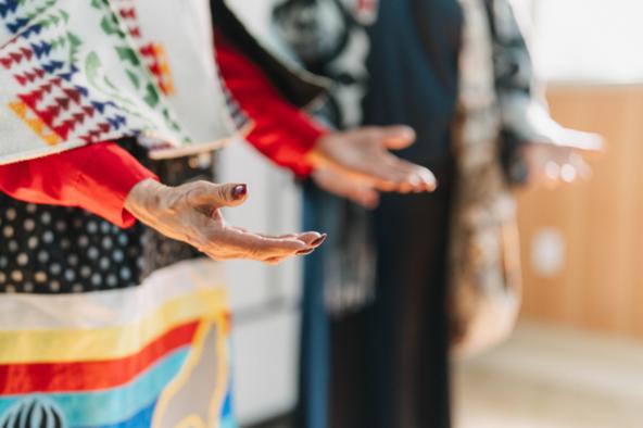 Hands outstretched